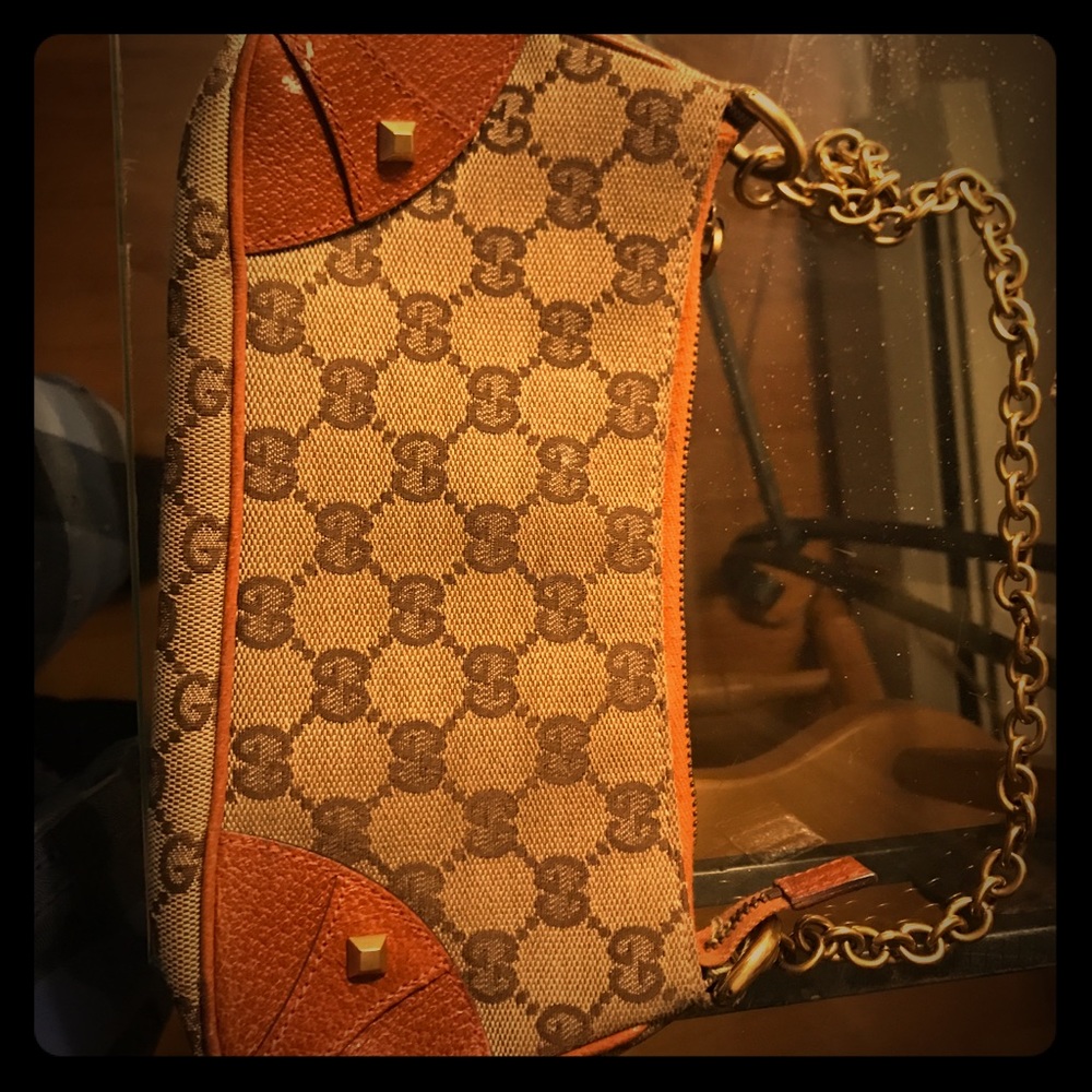 Vitale Gucci bag with G print and gold chain